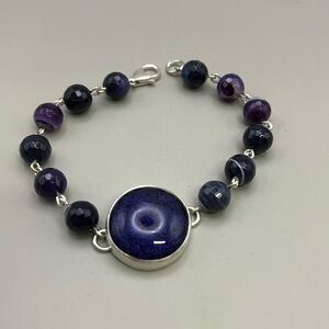 Elegant Purple and Silver Bracelet with Concentric Design